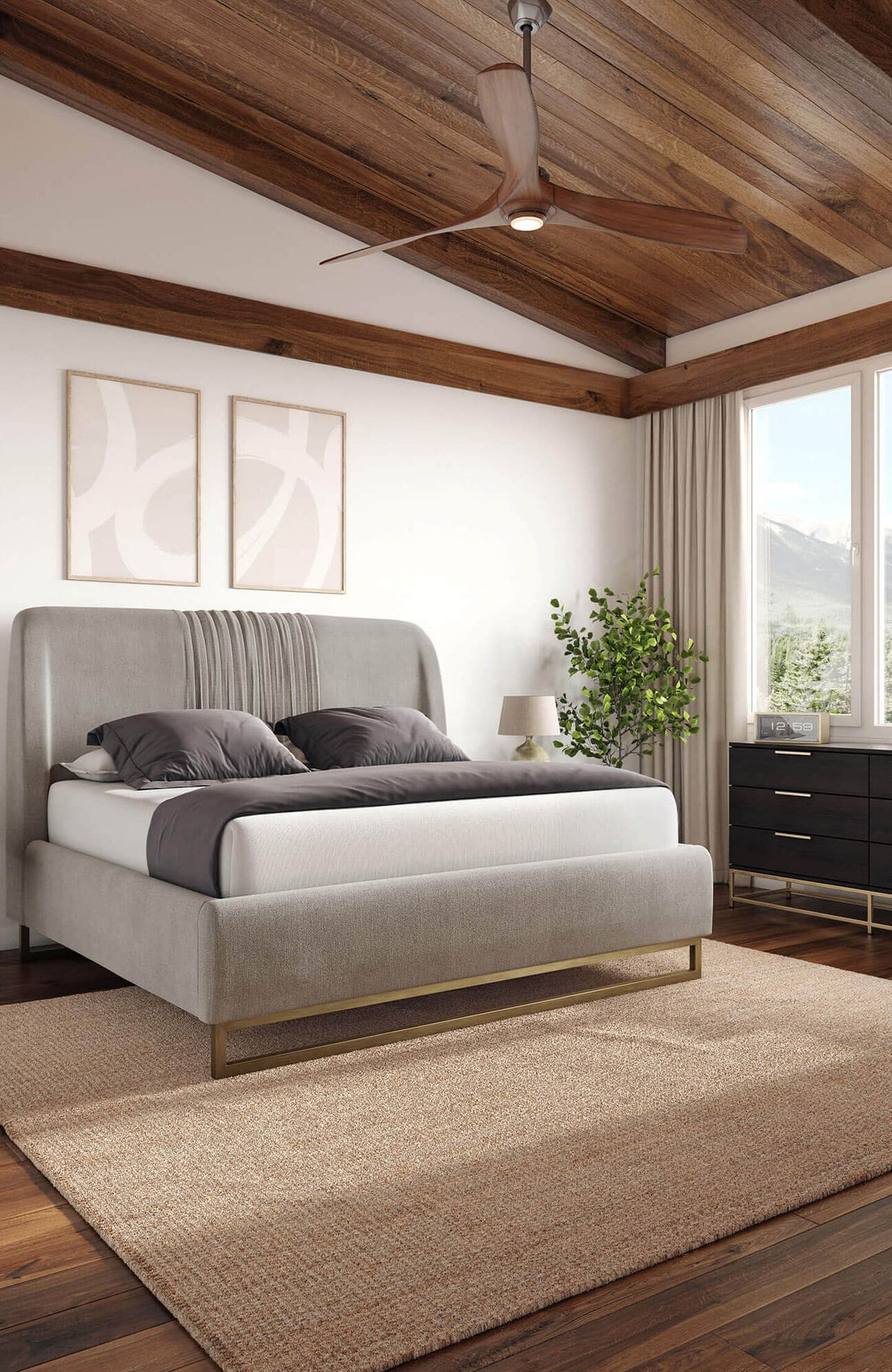 A light and airy bedroom with a bed and two big picture frames above the bed.