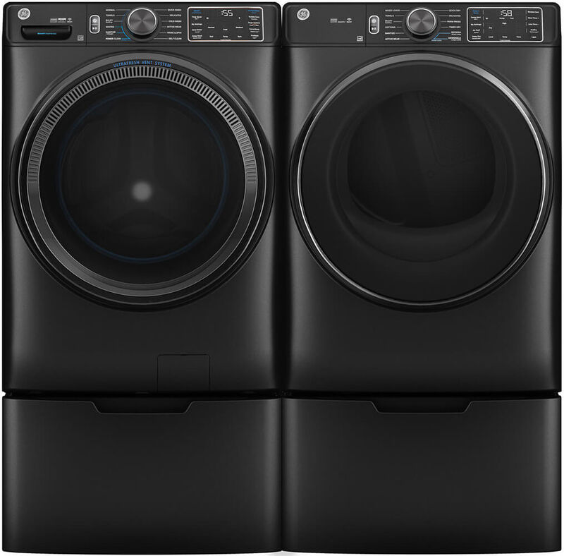 ge front load laundry pair on pedestals in graphite black