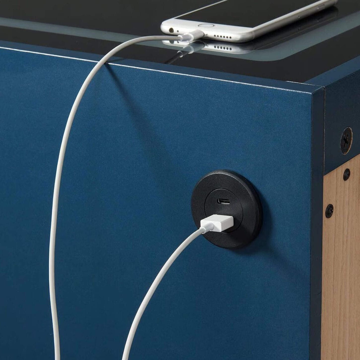 blue end table with charging port and cable