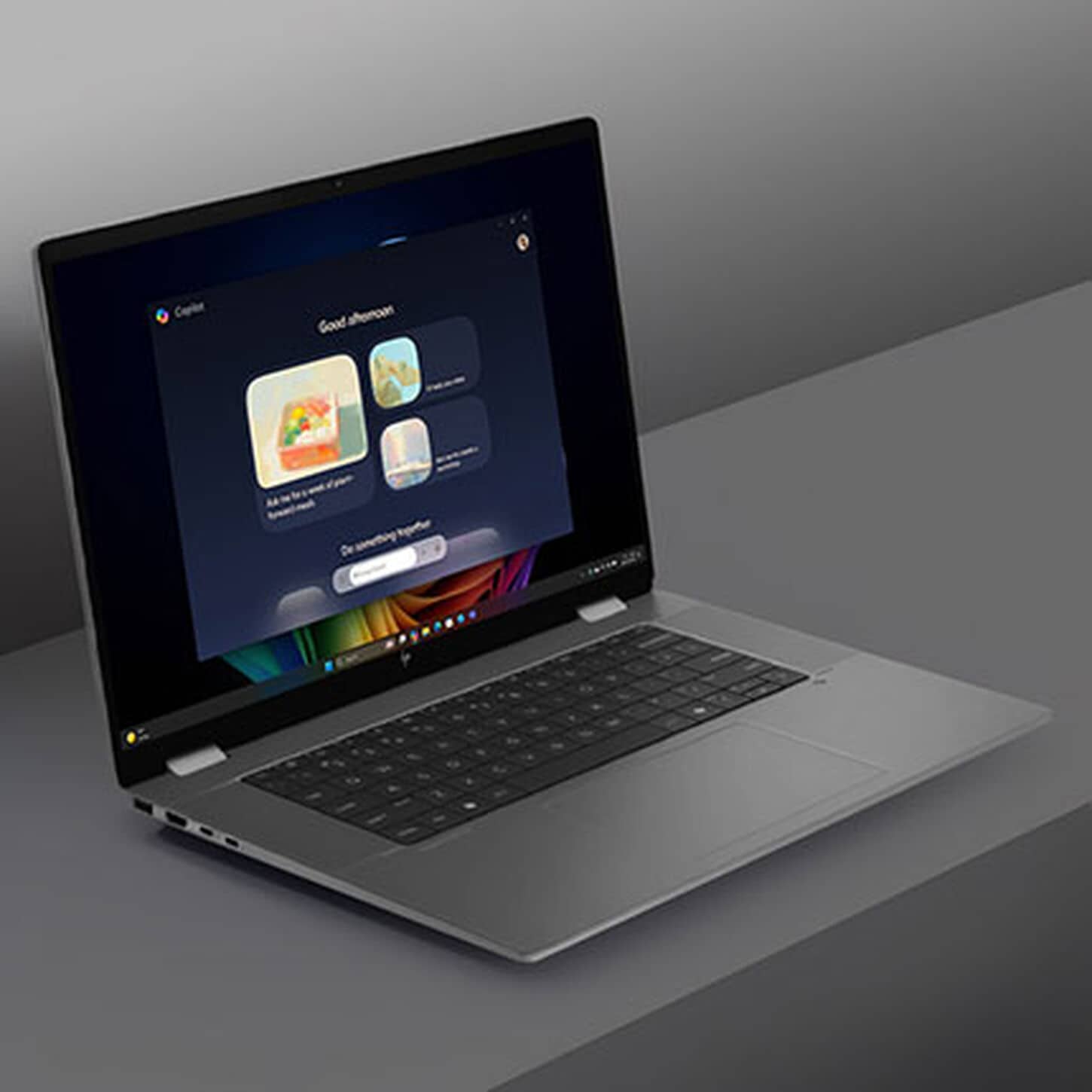 HP AI Laptop on Grey background