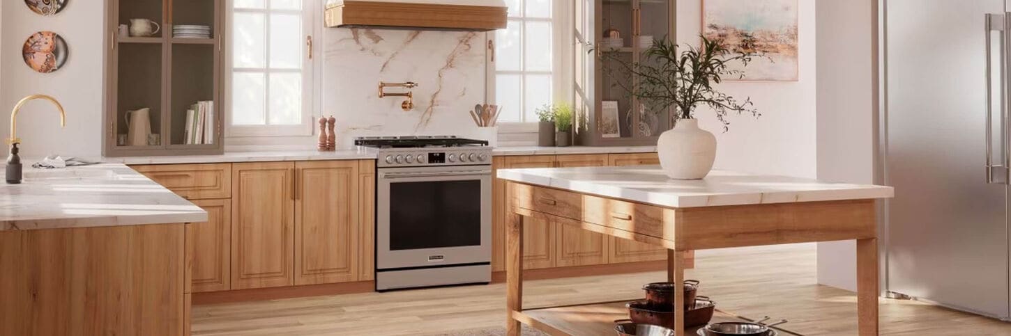 Frigidaire Professional kitchen appliances in kitchen with warm wood accents