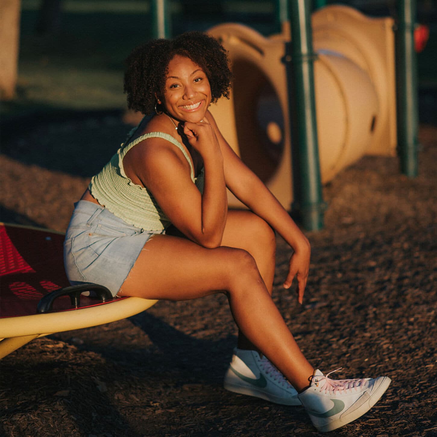 TyJanae posing at a playground