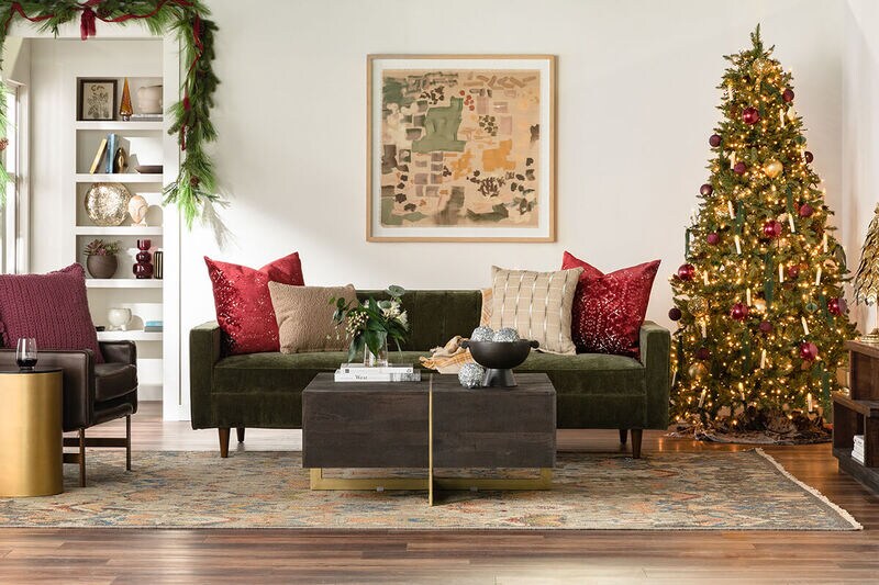 Living room with holiday decor and christmas tree on display