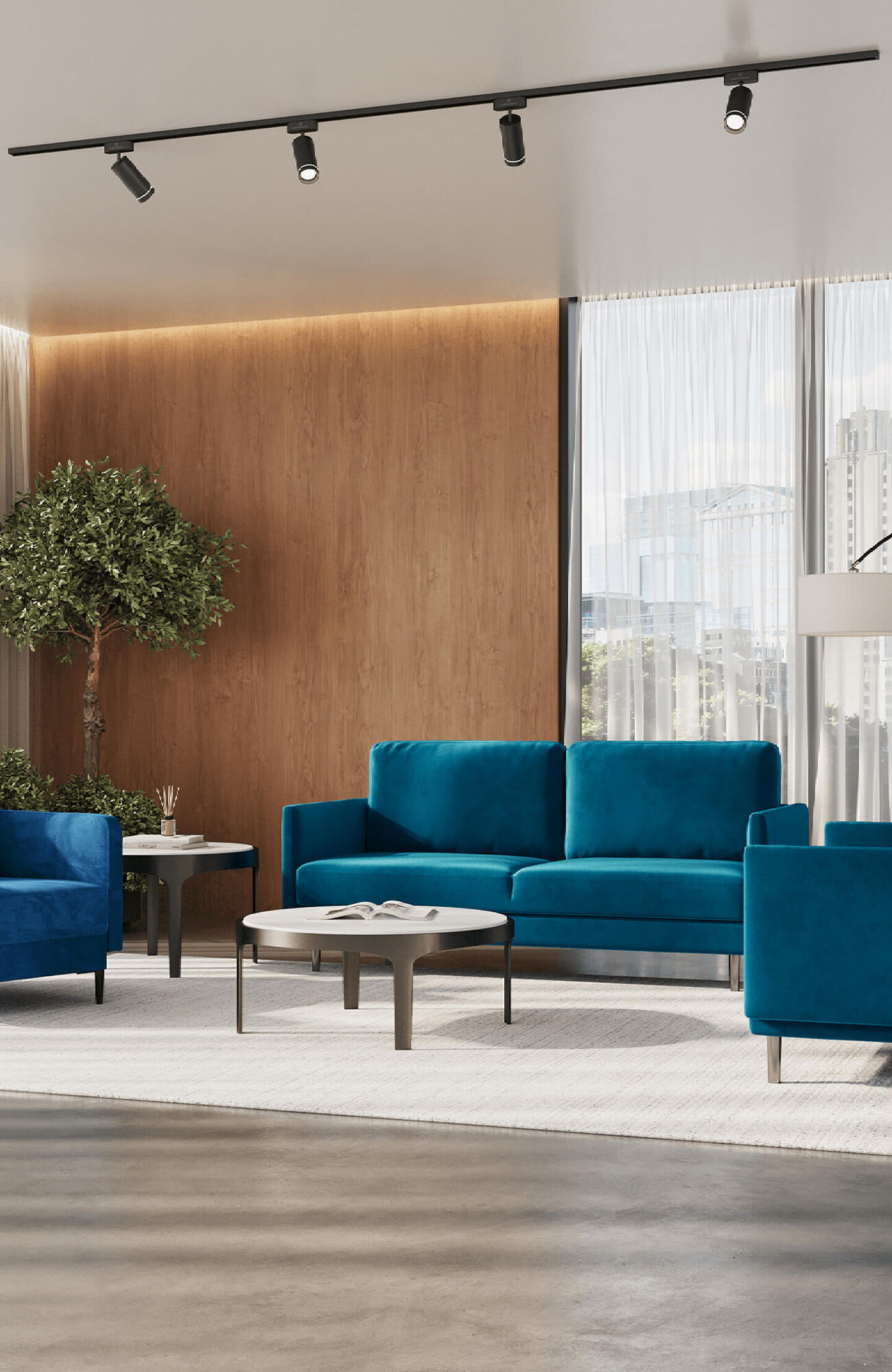 A living room with a blue sofa and blue chair.