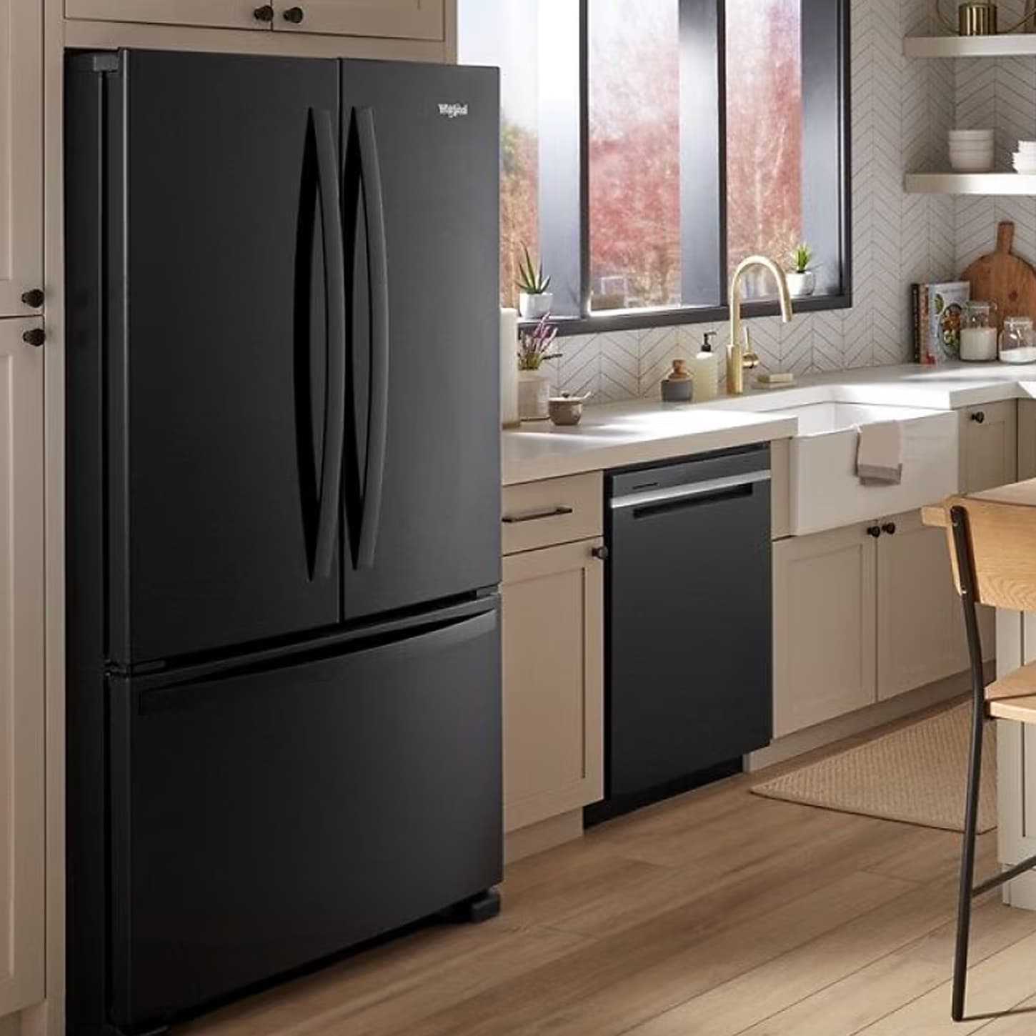 whirlpool stainless steel refrigerator in kitchen