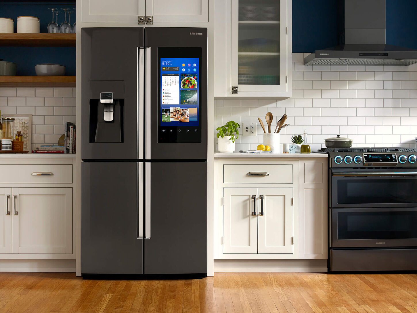 kitchen with an upgraded fridge with a screen