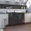 A laundry room featuring a stylish washer and dryer 