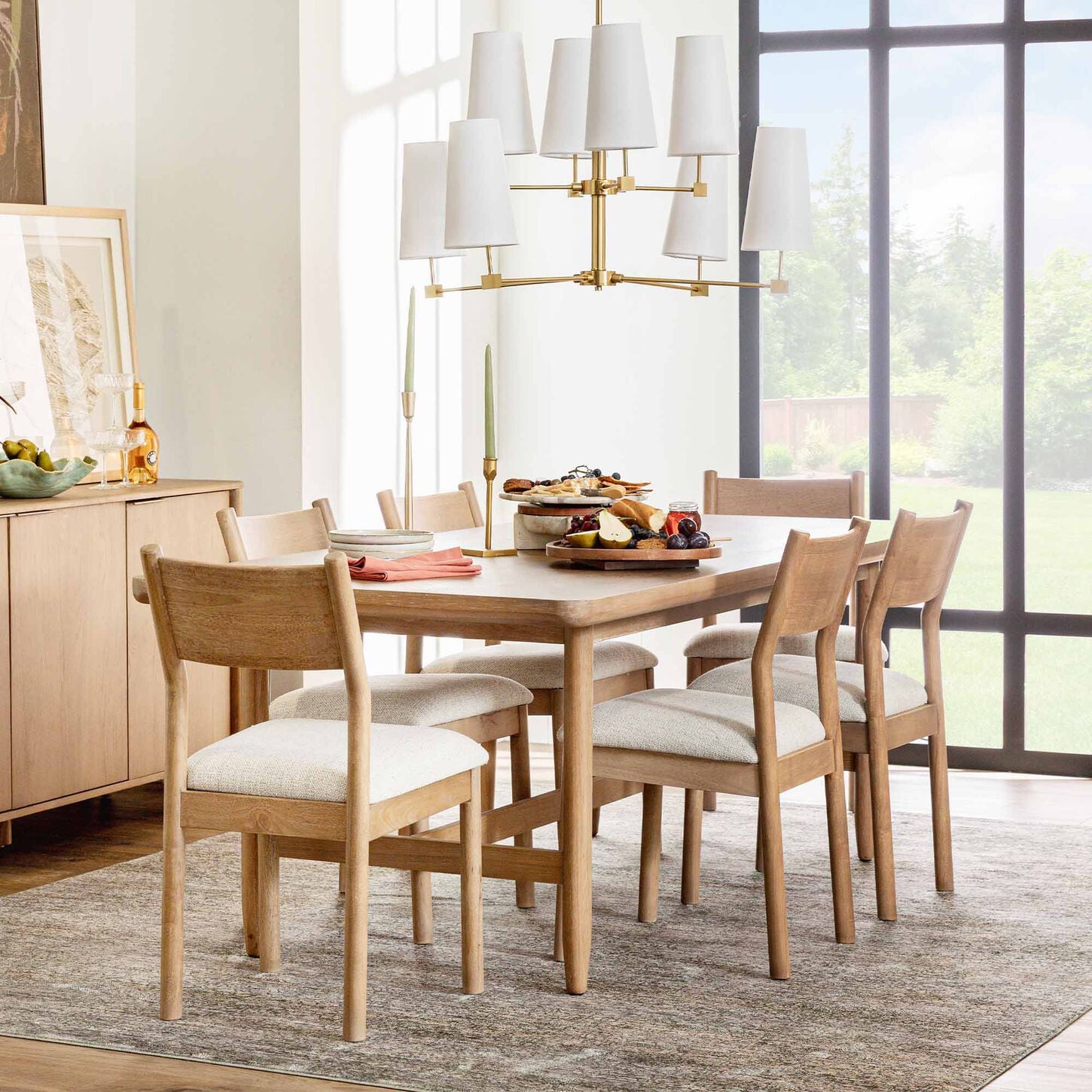 Light wood dining set in a bright dining room