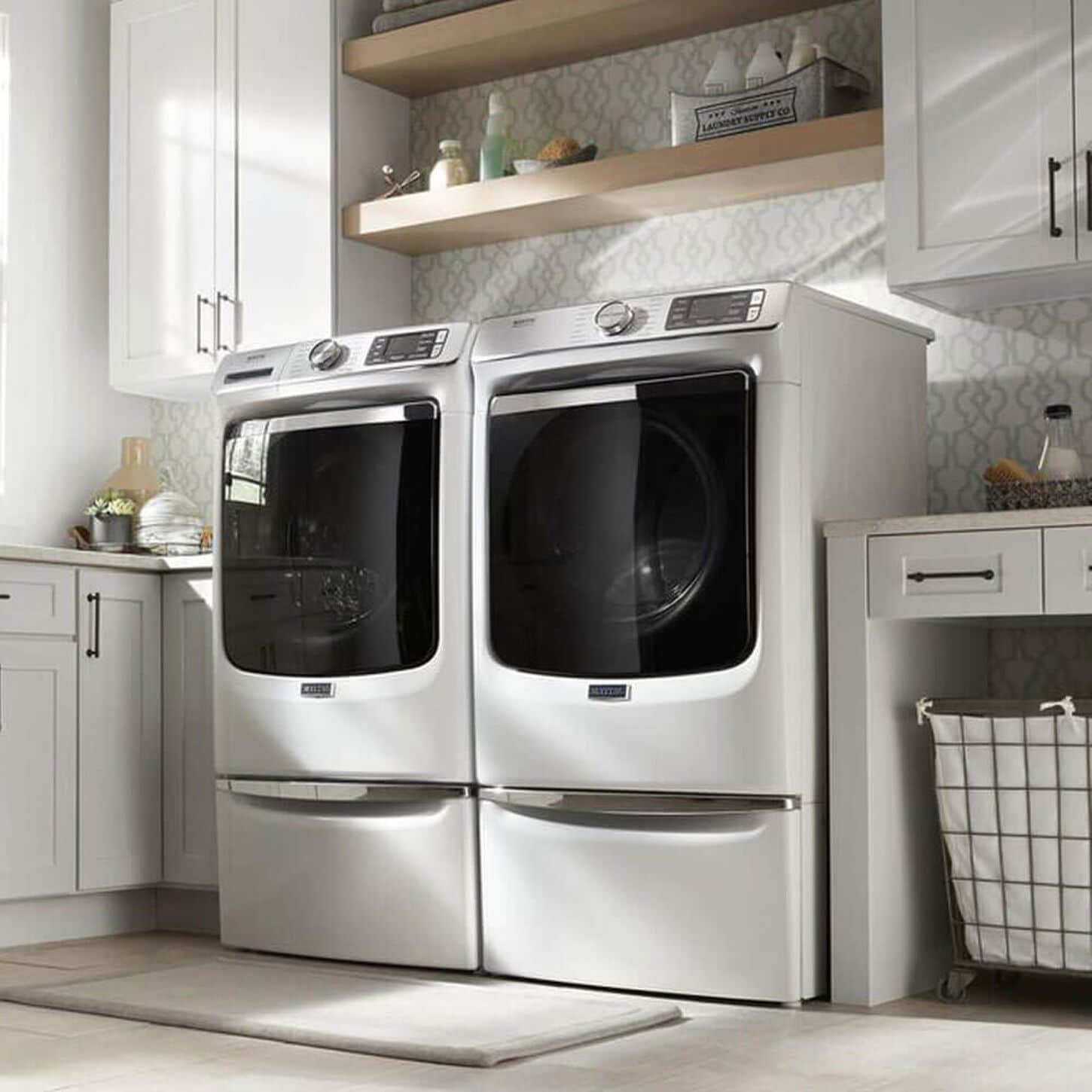 Maytag 5 Cu. Ft. Front Load Washer and 7.3 Cu. Ft. Gas Dryer Laundry Pair with Pedestal in White