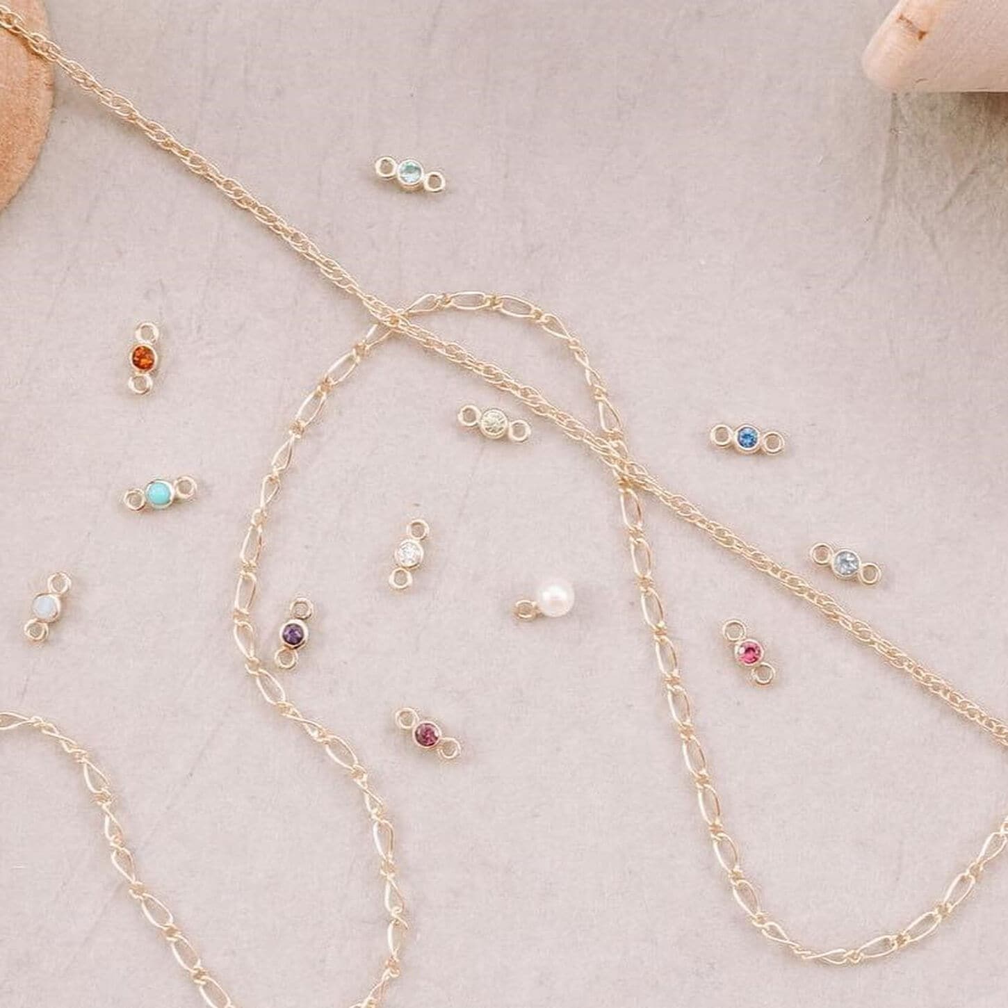 Various types of jewelry including necklace and earrings.