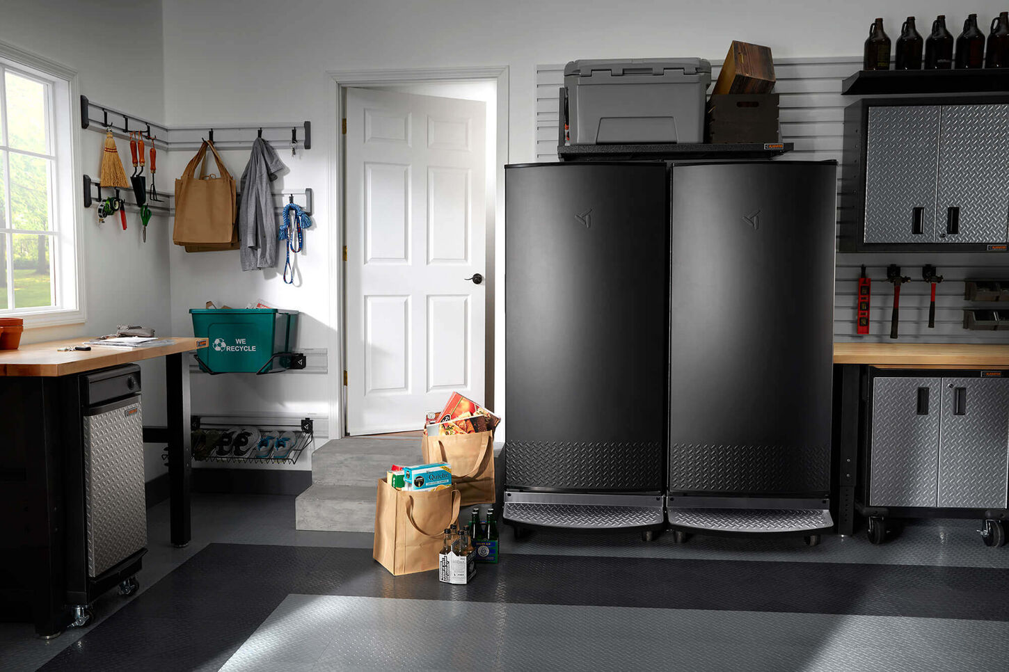 An organized garage with storage on every wall.