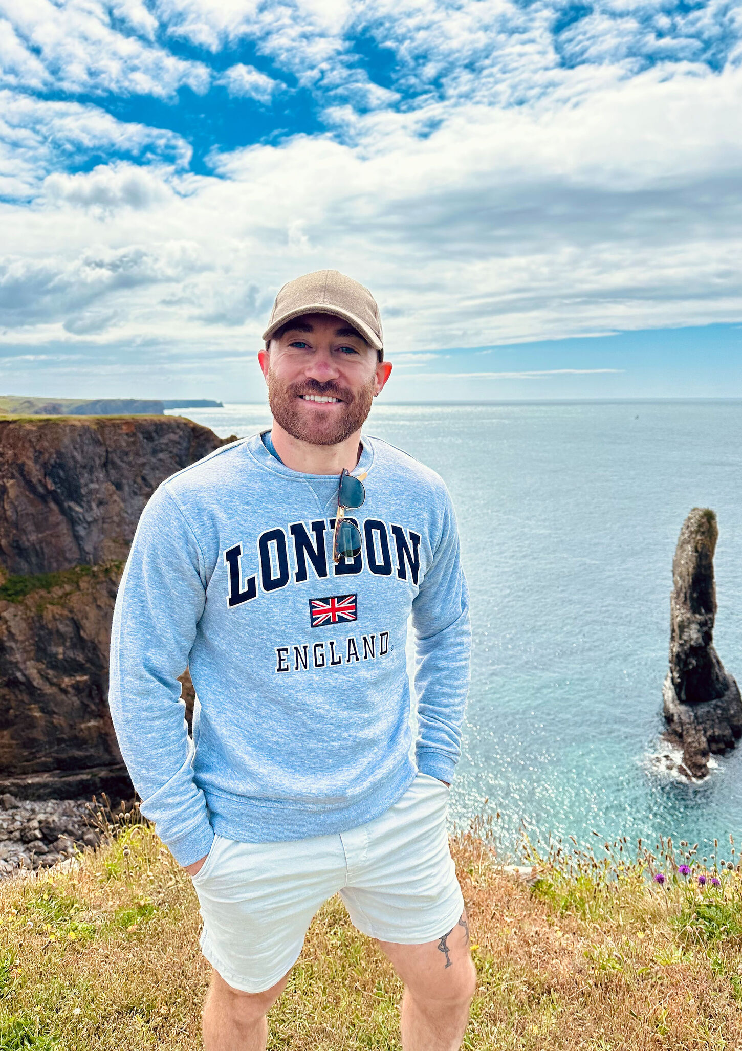 Jake in London shirt at the beach