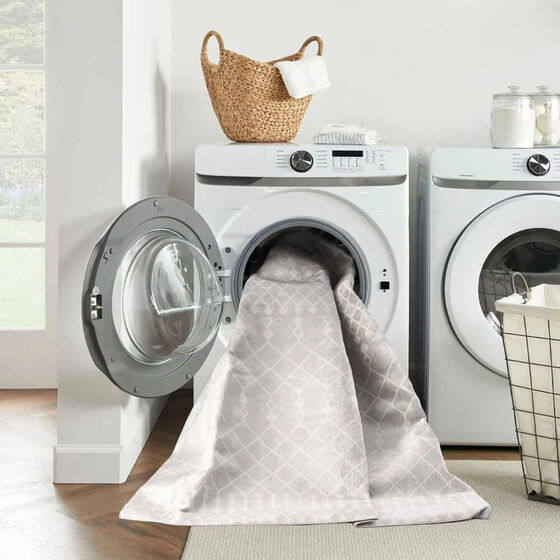 Machine washable area rug inside washer