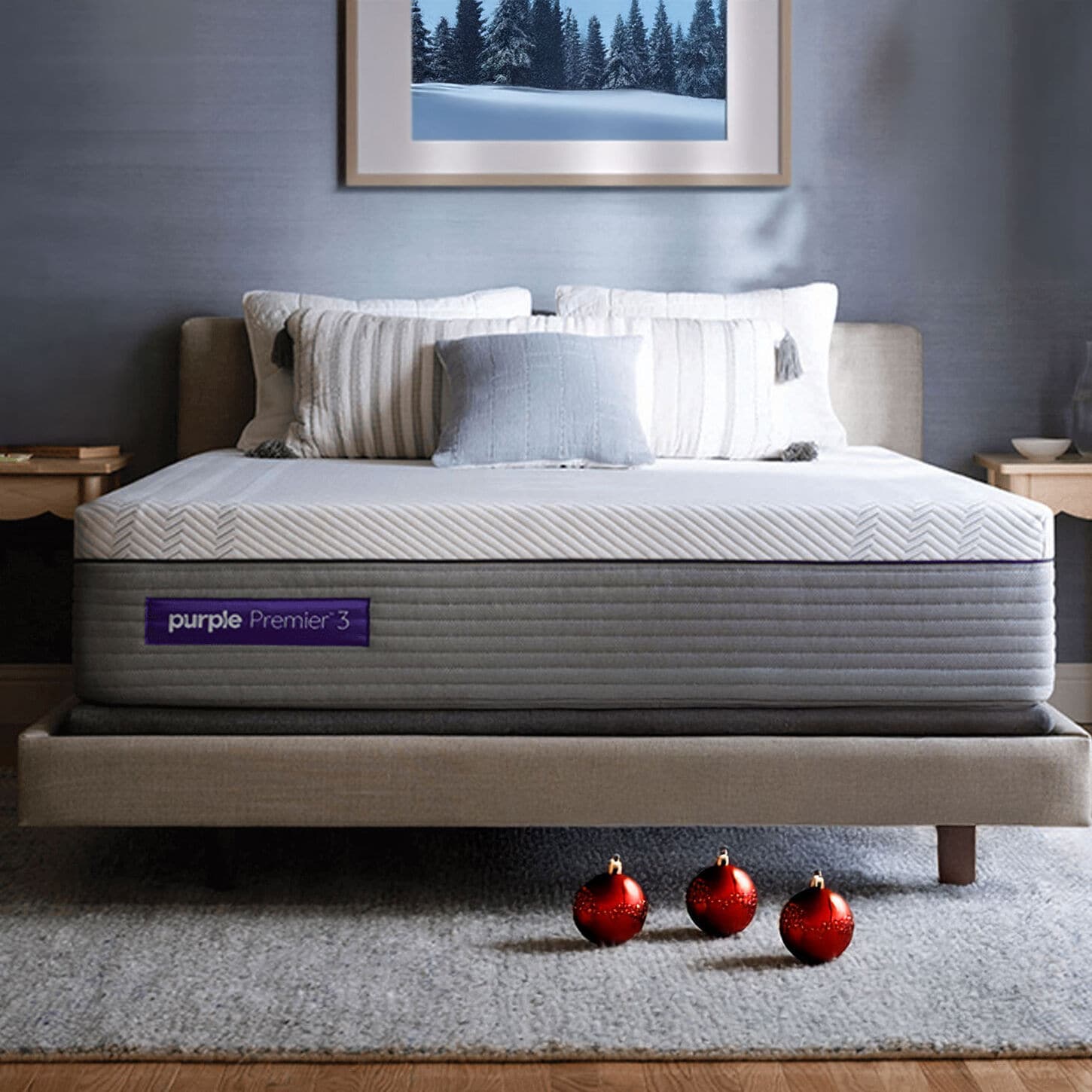 Purple mattress on bedframe with blue walls and holiday decor