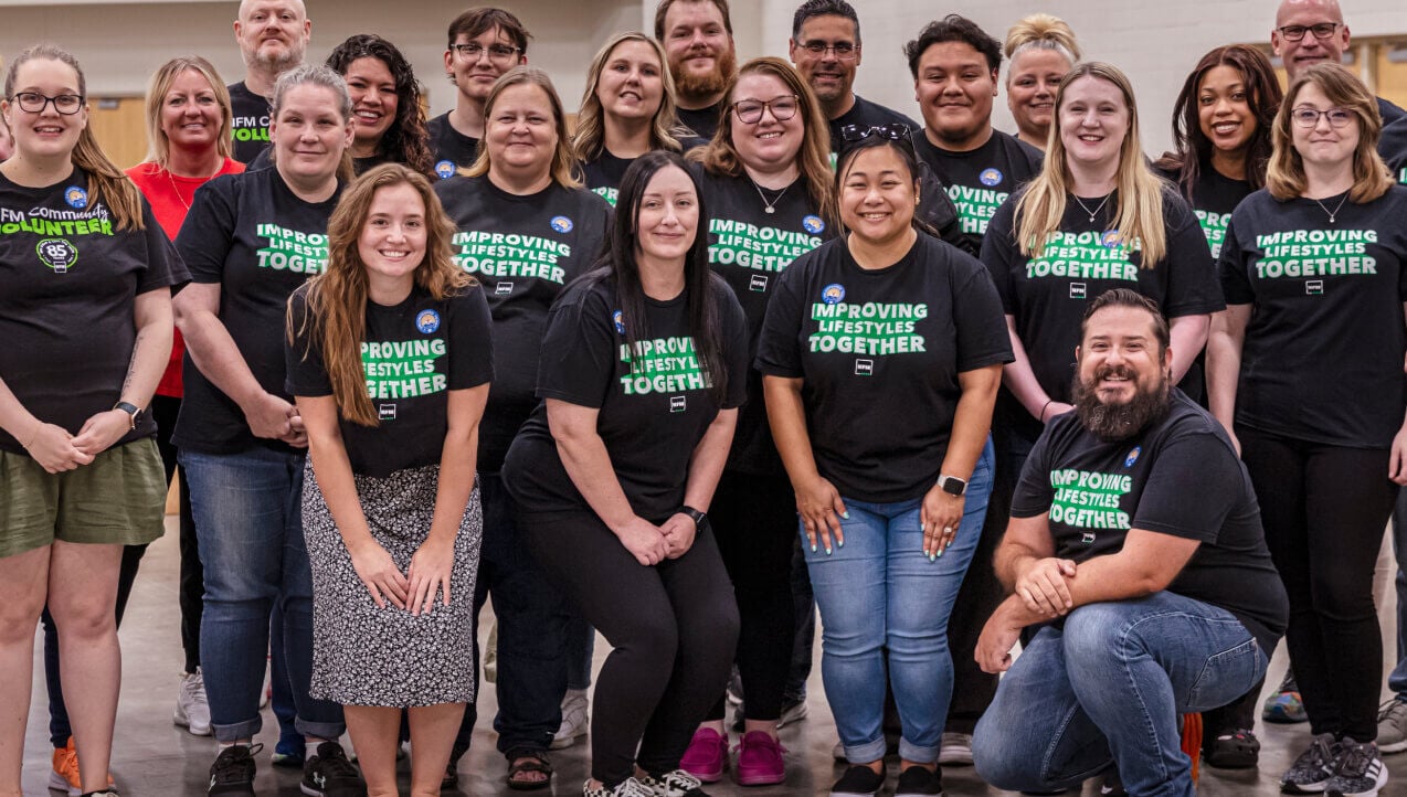 Group of NFM employees at a community volunteer event