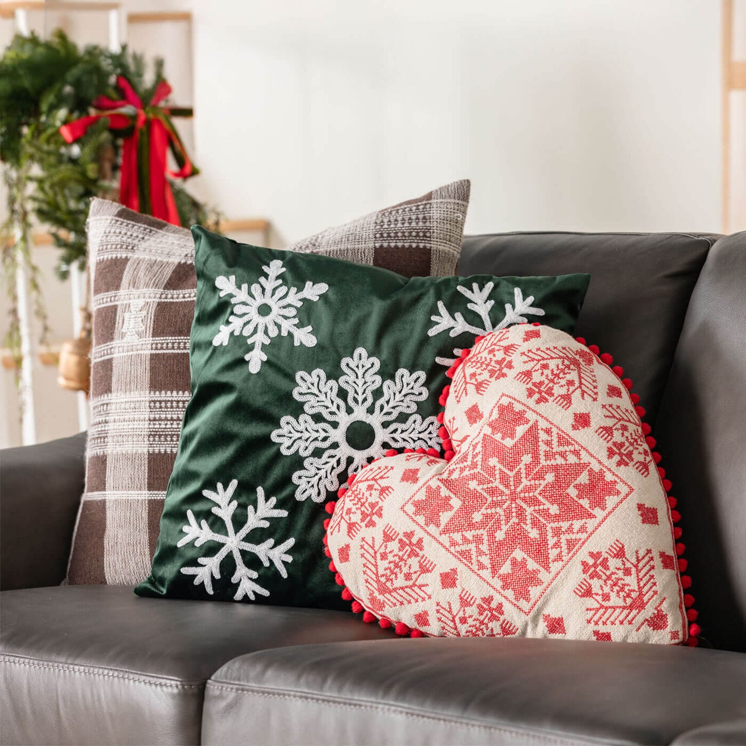 Holiday home decor with trees and toss pillows