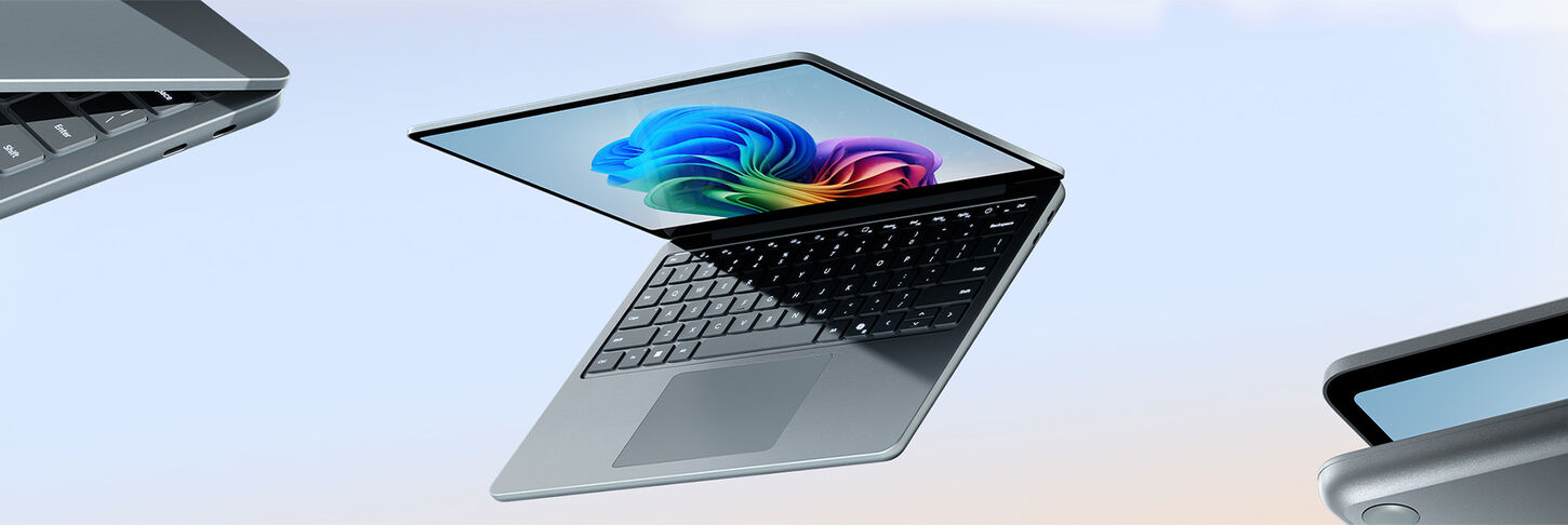 Surface laptops on blue ombre background
