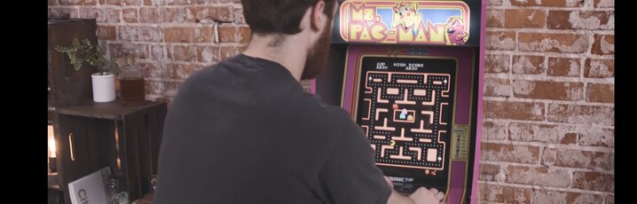 Video thumbnail of man playing Ms. Pac-Man arcade game