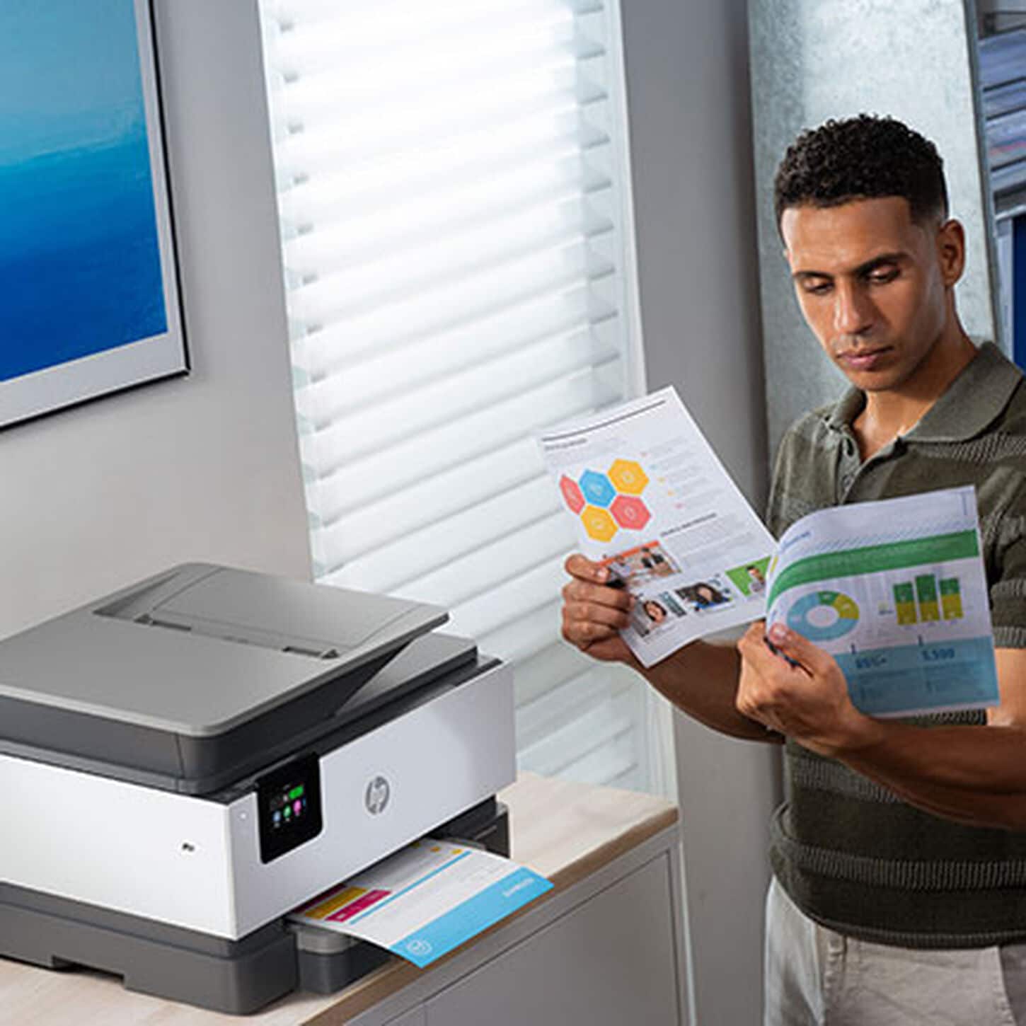 Person reviewing printed documents