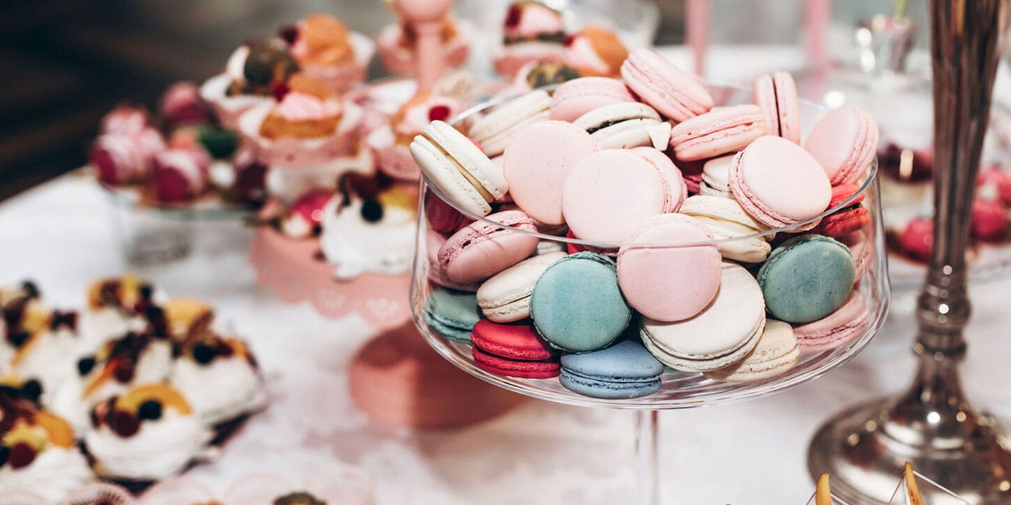 Tablescape with macaroons and various desserts for Galentine's Day