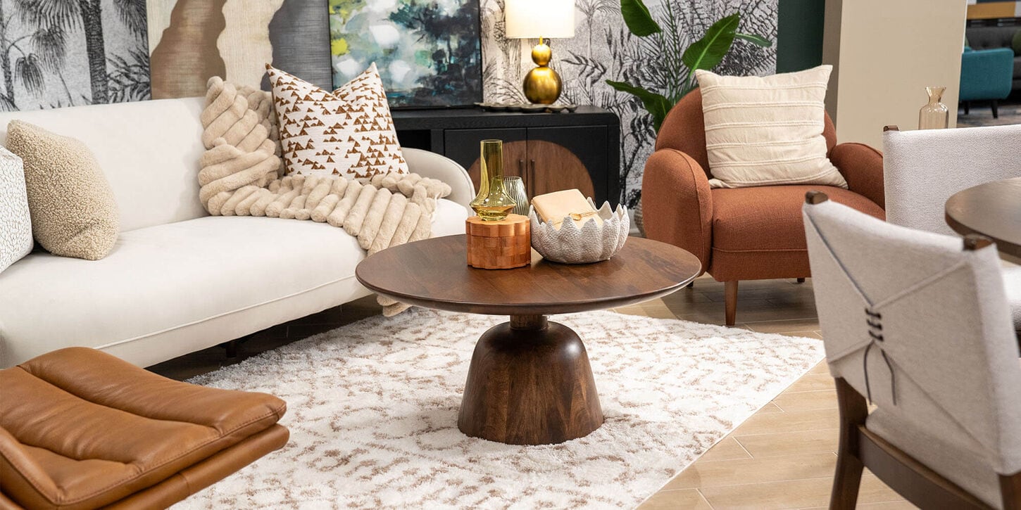 37b limited drop furniture with a rug, sofa, chair, coffee table and lamps