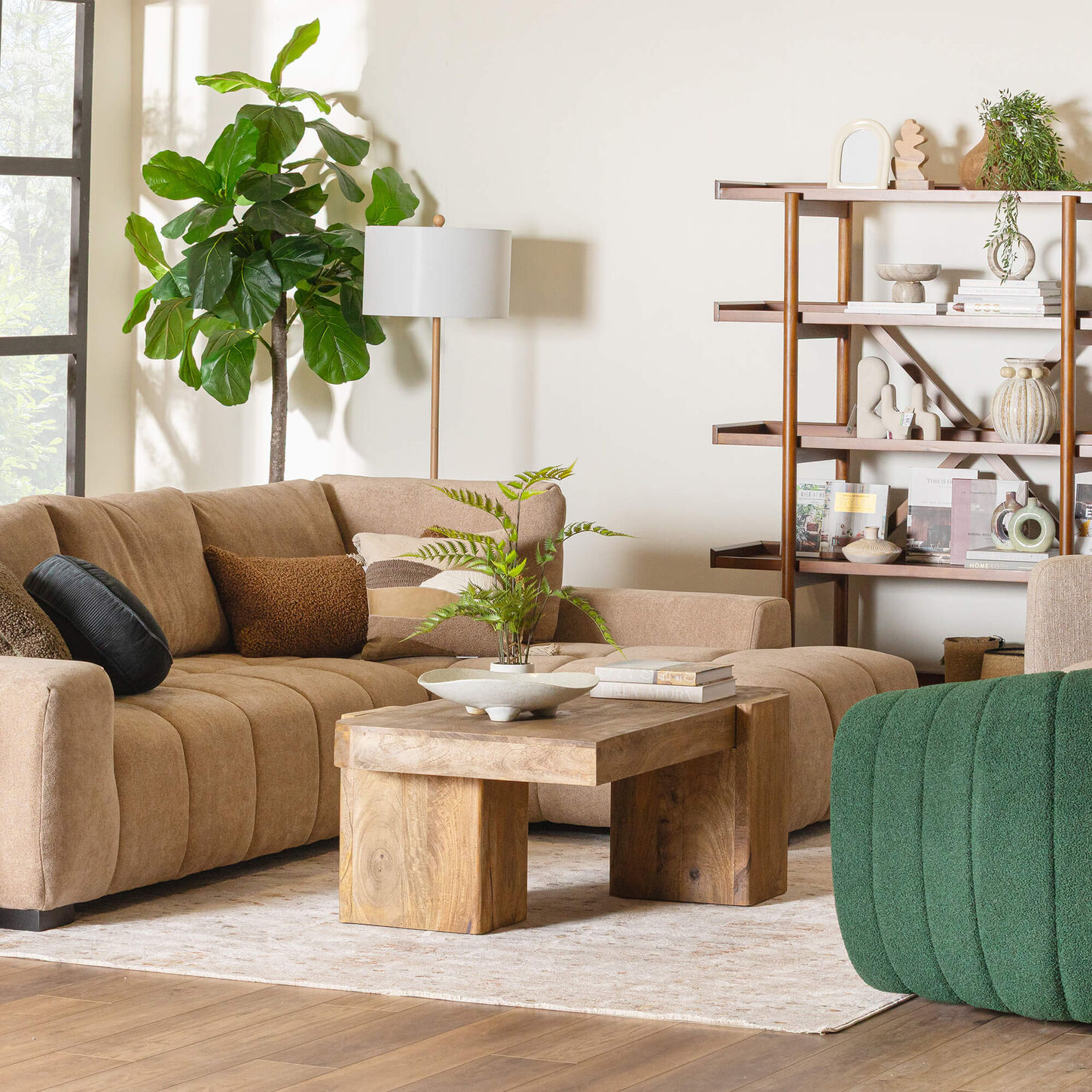 Mid-century light tan sectional design with a modern wooden coffee table