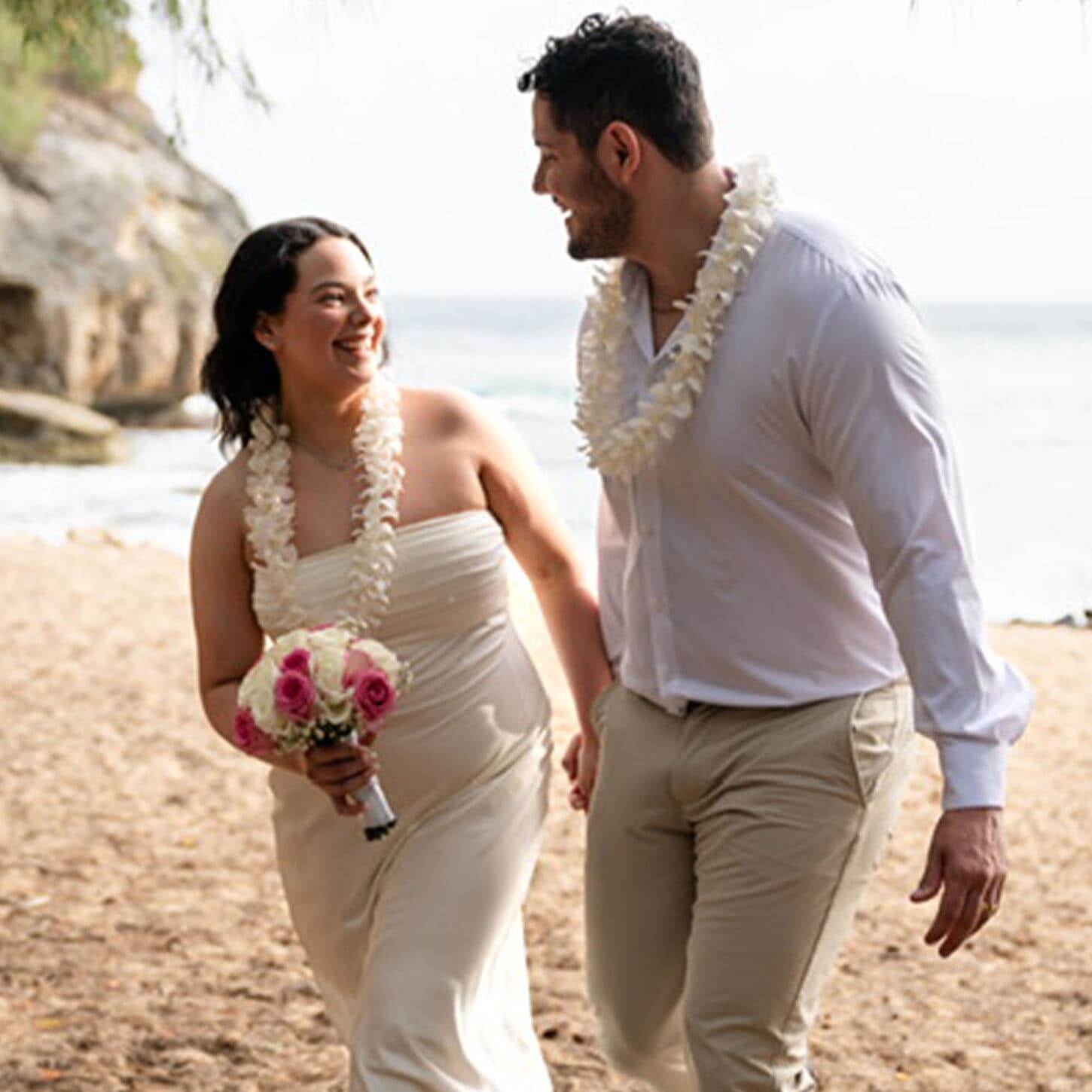 Ashley and Jonathan on their wedding day at the beach