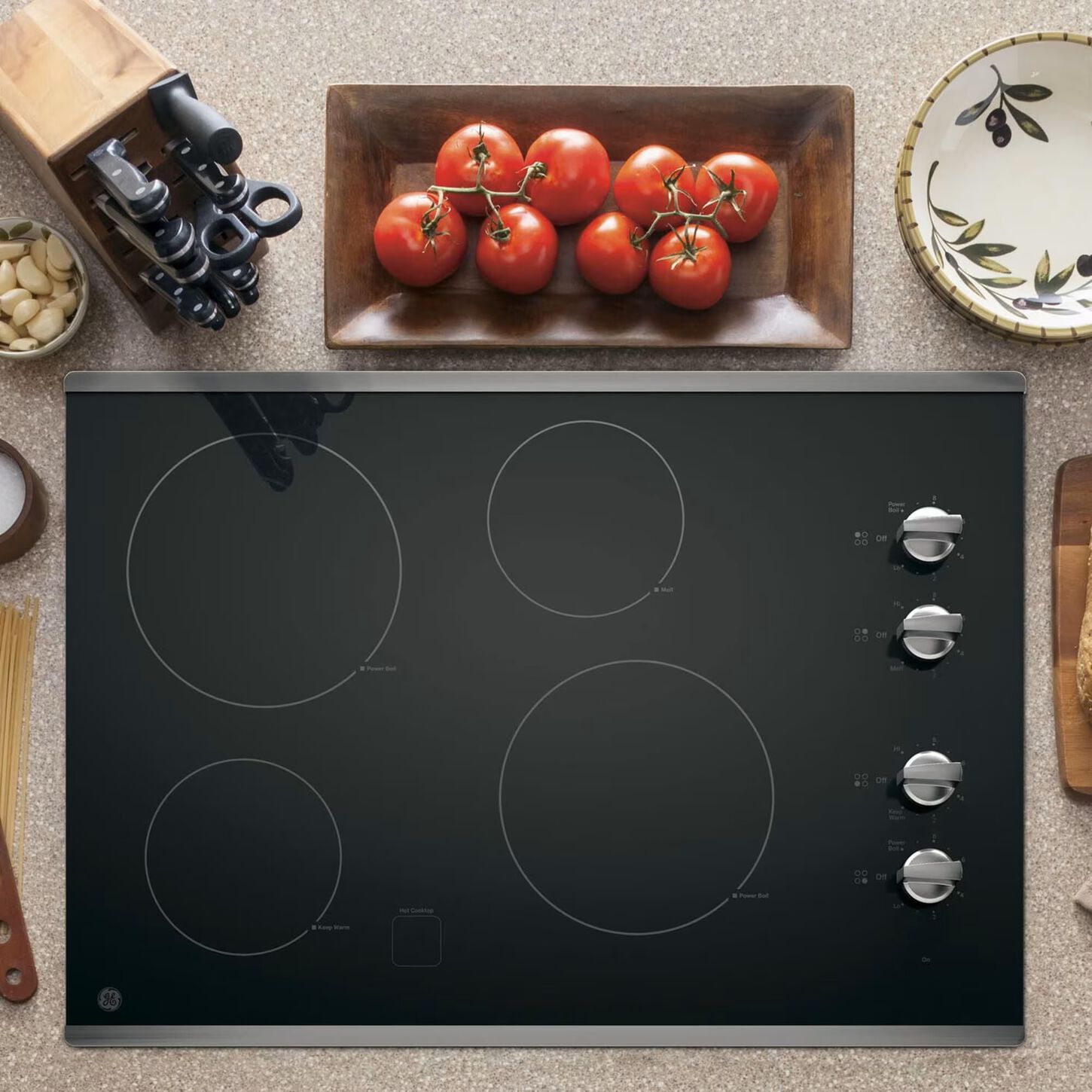 GE Appliances 30" Built-In Knob Control Electric Cooktop in Stainless Steel and Black