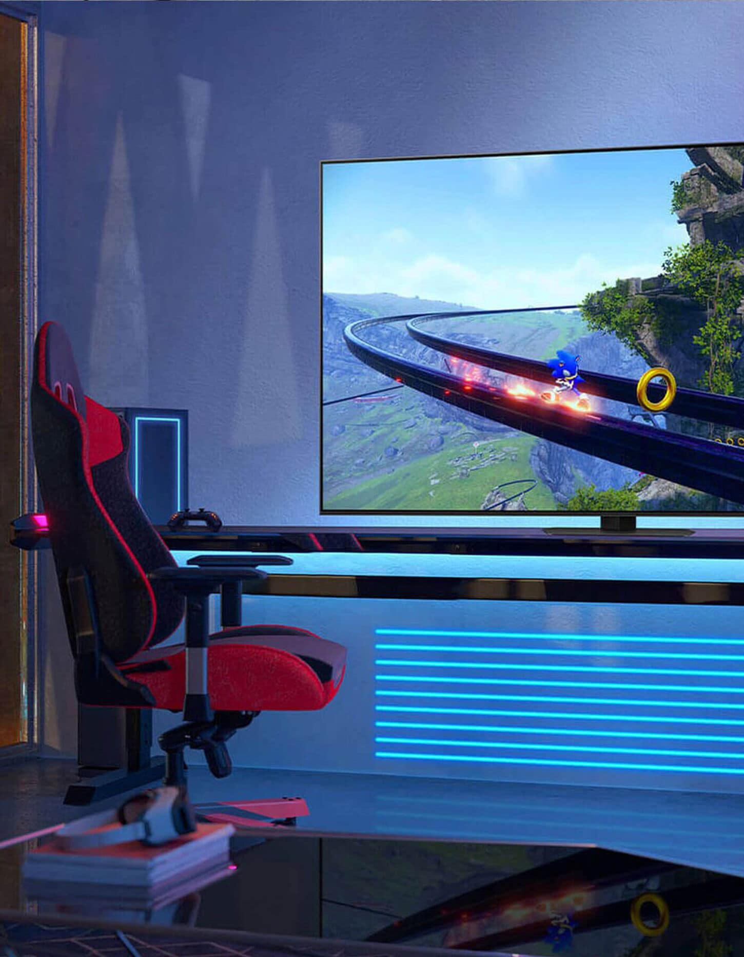 Living room with gaming chair and video playing on tv.