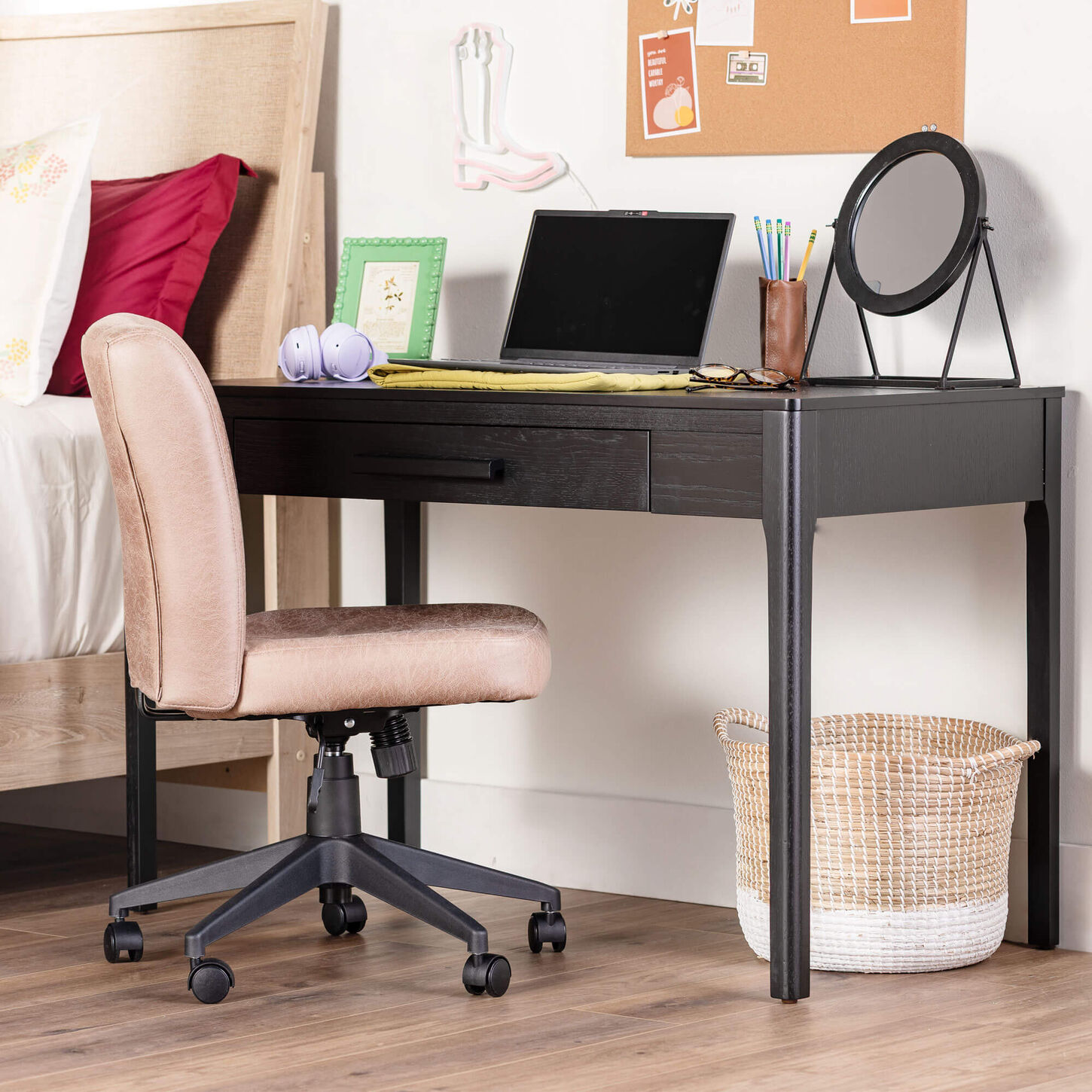 Desk with office chair and laptop