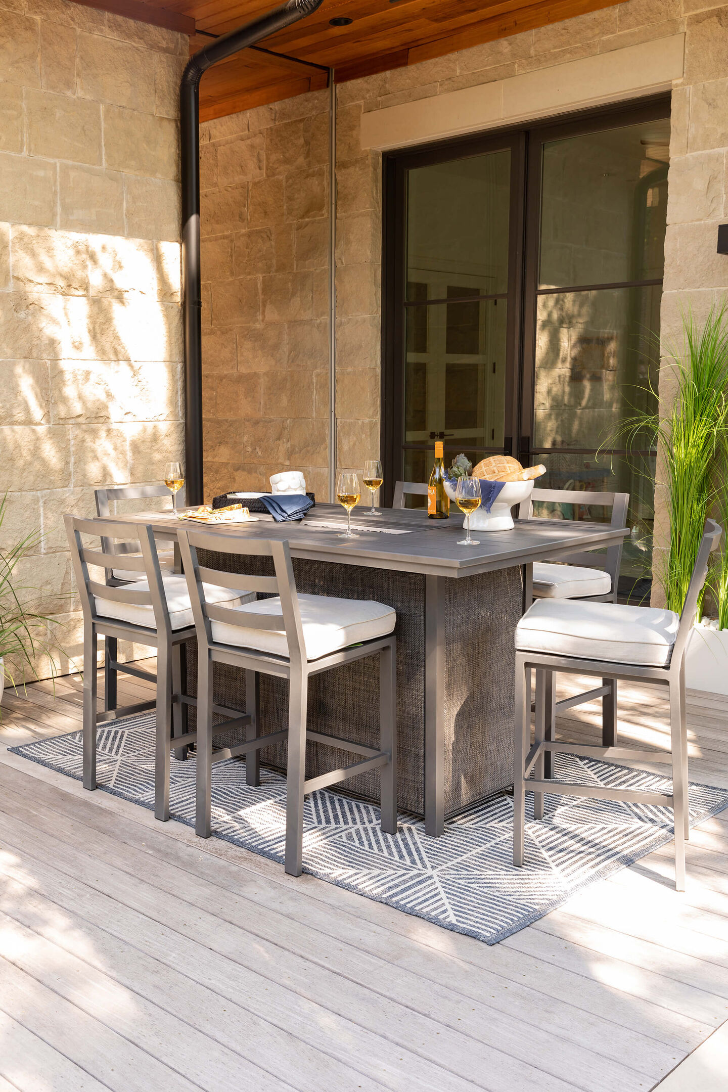 Covered outdoor eating dining tables with grill and food on table