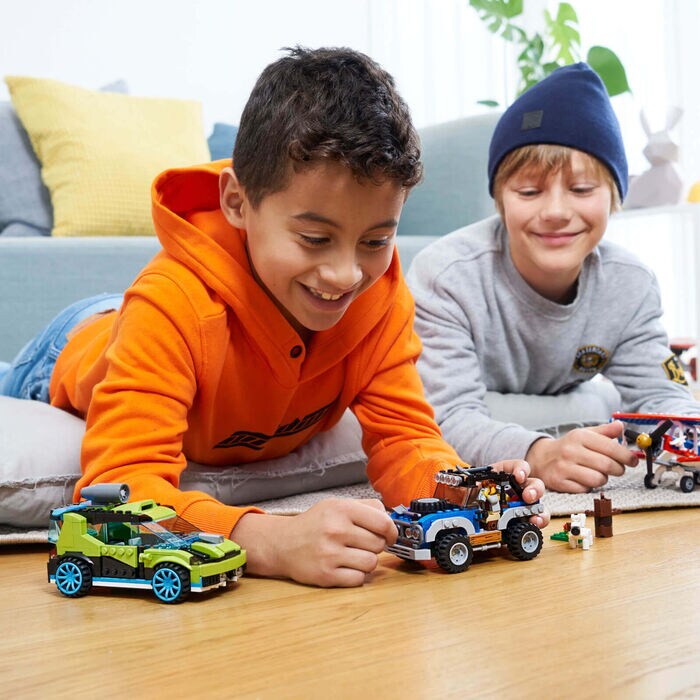 Two Boys Playing With Legos