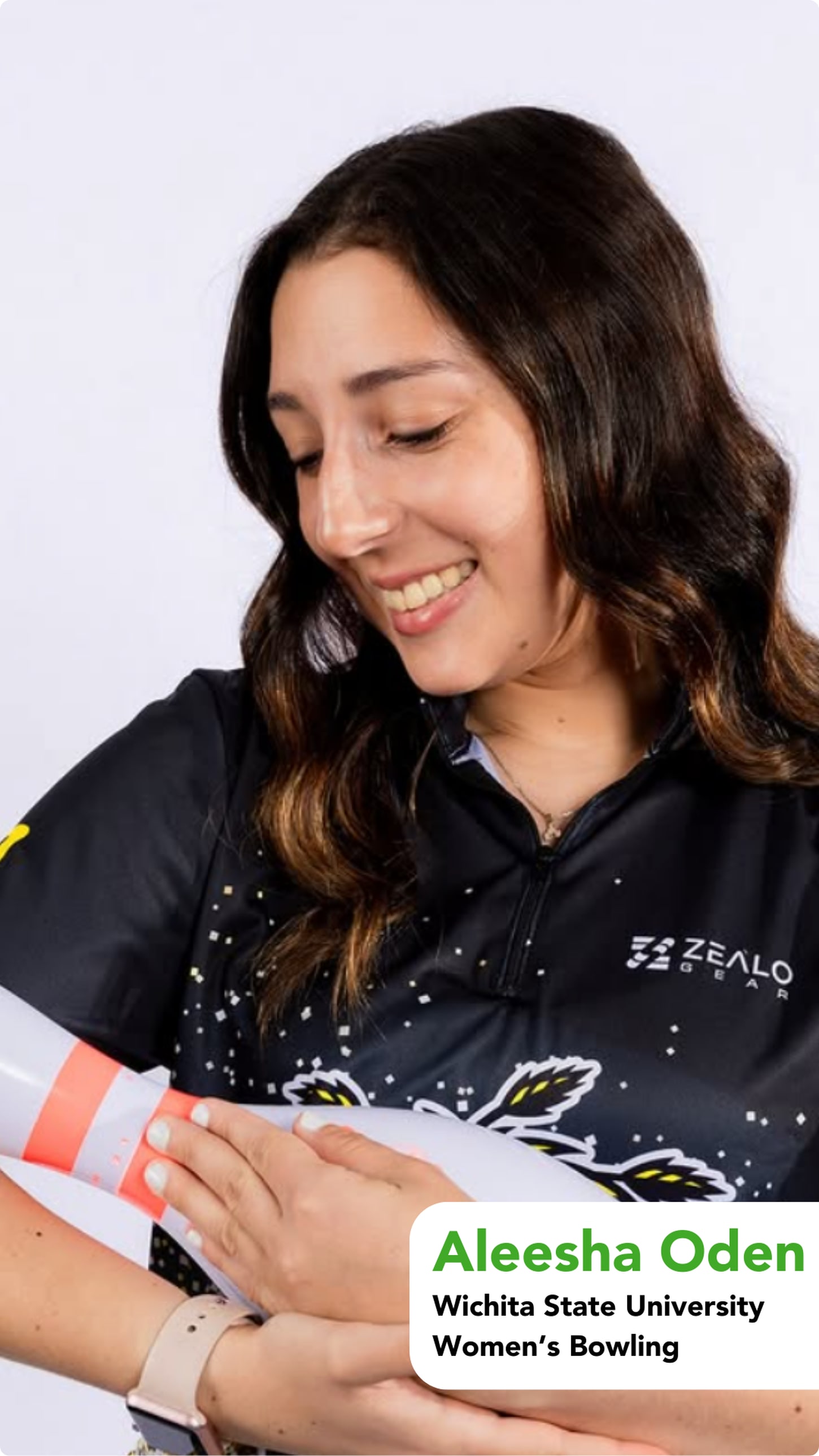 Bowler Aleesha holding a bowling pin