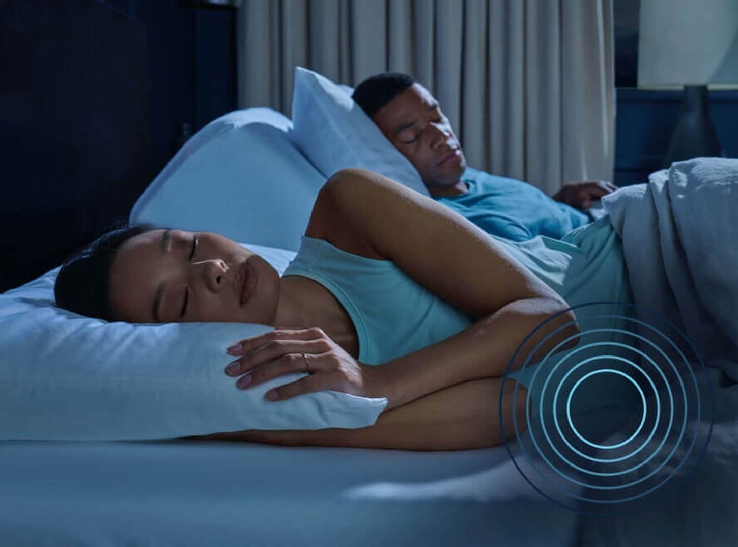 Couple Relaxing on a Tempur-Pedic Mattress