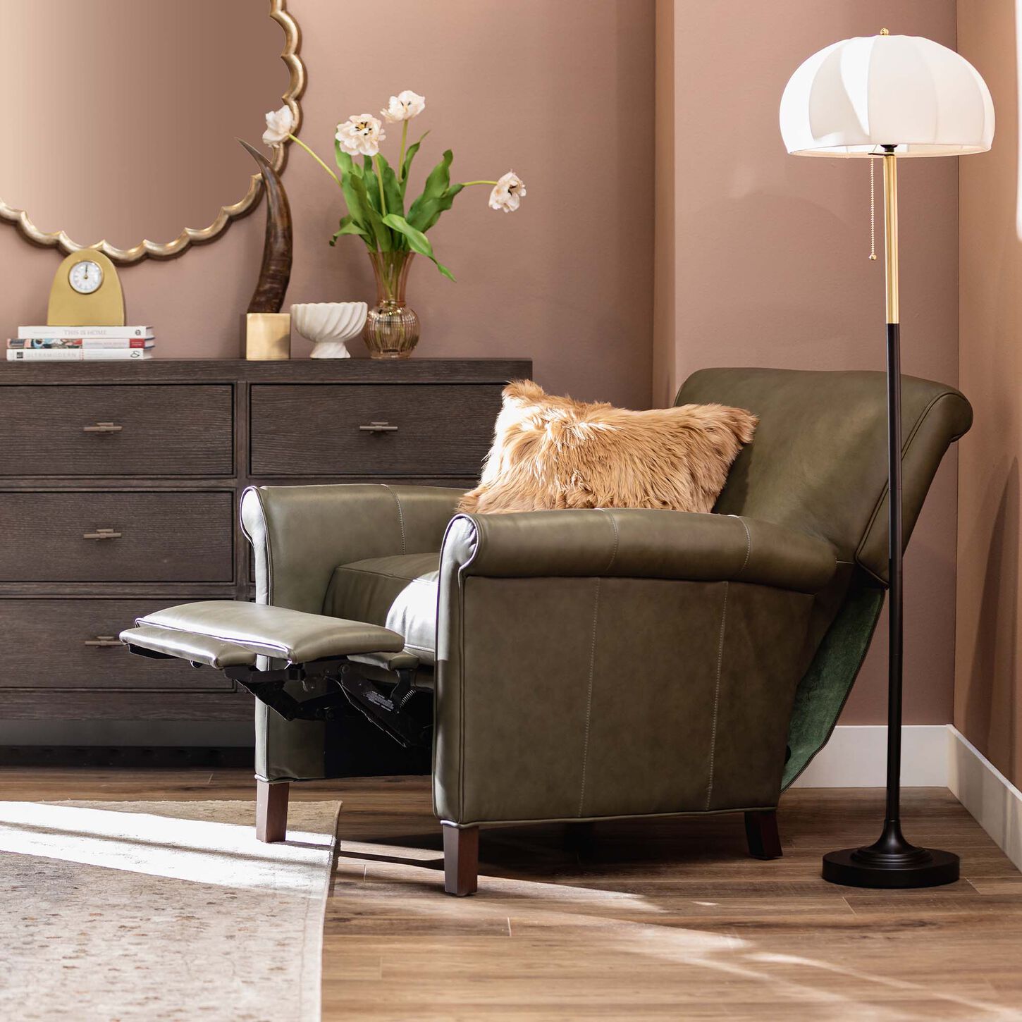Green leather recliner in a bedroom
