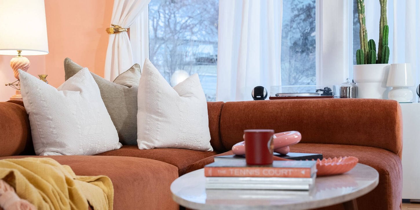 37b limited drop furniture with a rug, sofa, chair, coffee table and lamps