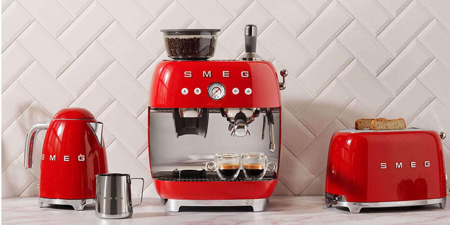 SMEG Small appliances all in red including a toaster, coffee maker and electric kettle