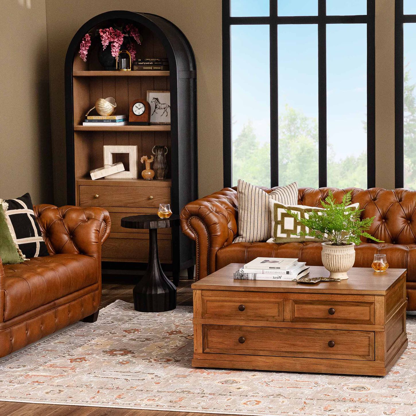 Tanned leather sofas in a brown living room