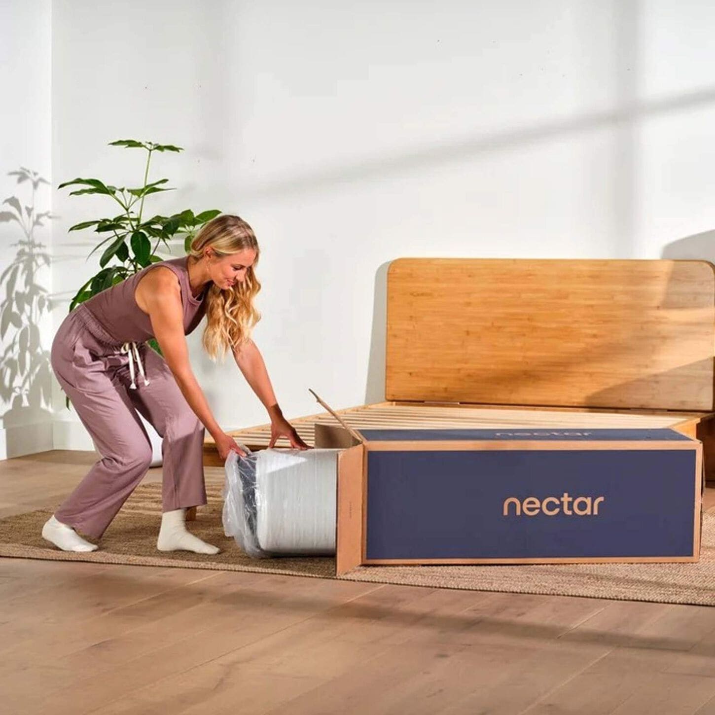 Woman Unboxing Mattress in a Box