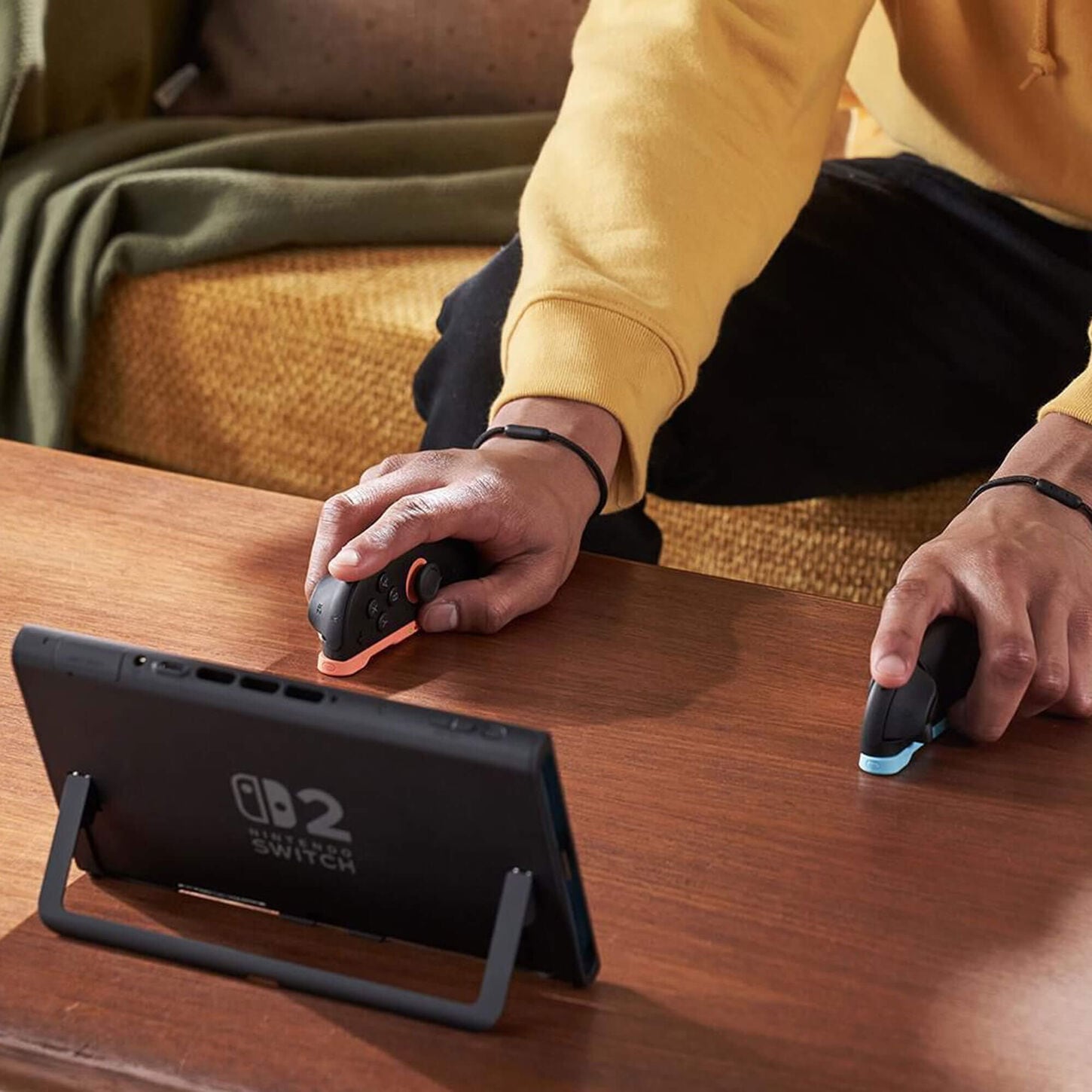 Laptop on a desk in a dorm room with blue office char