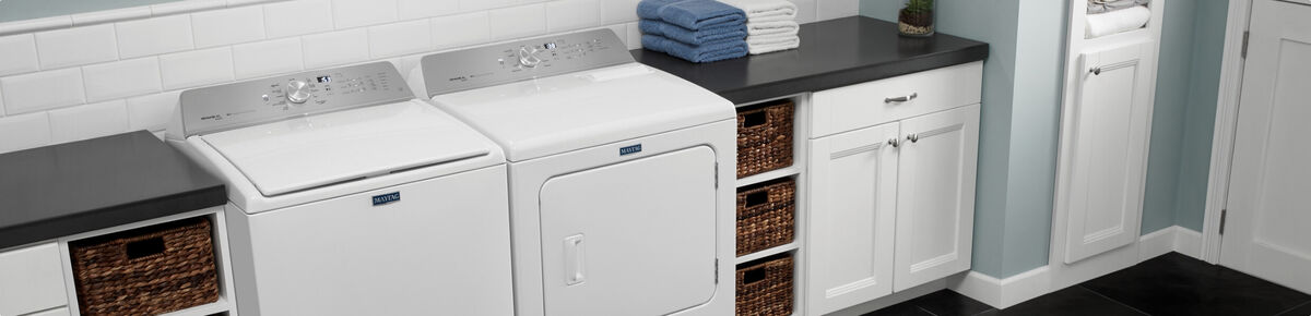 Clean Laundry Room with Washer and Dryer
