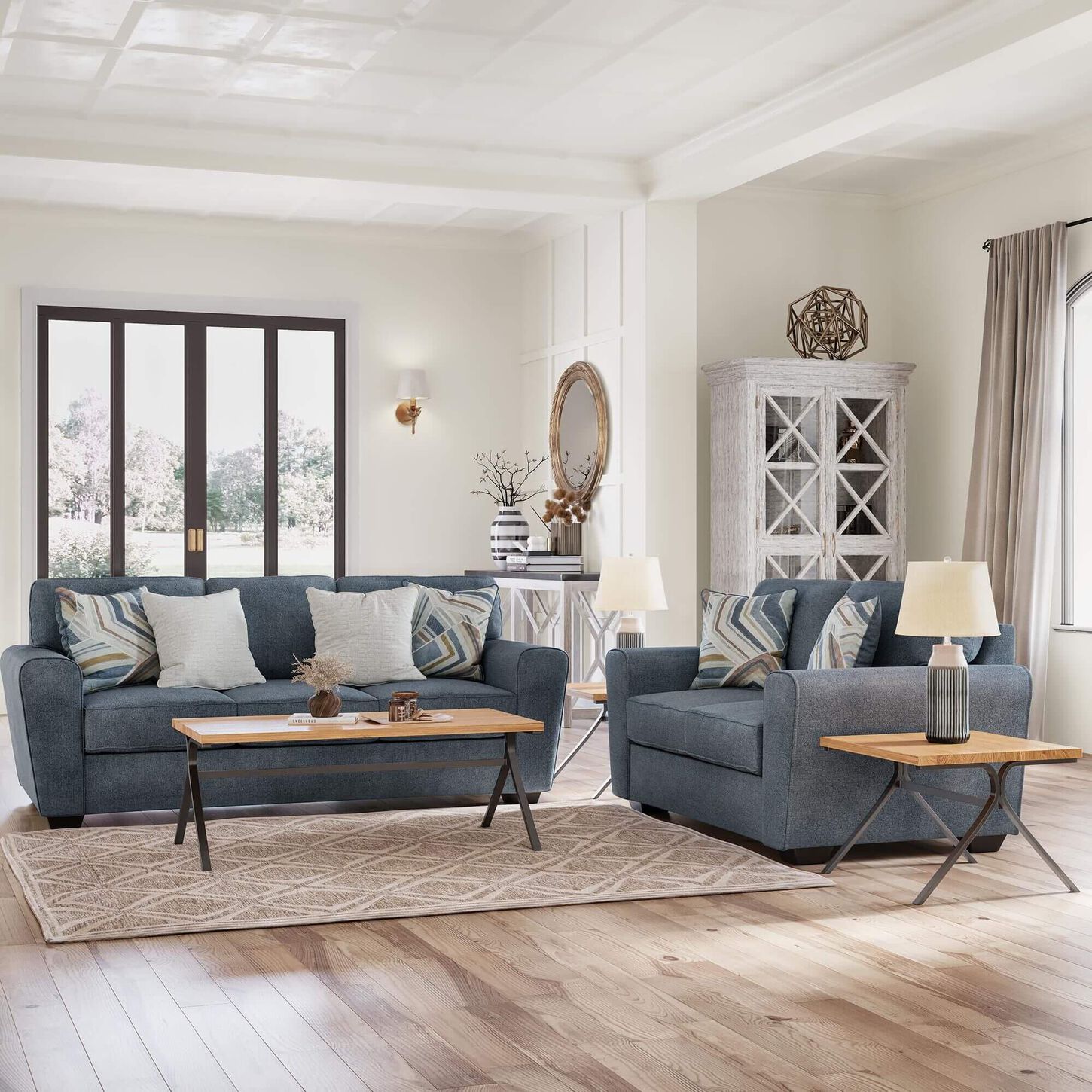 living room with light blue sofa and loveseat and light brown coffee and end table