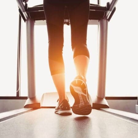 Woman walking on treadmill