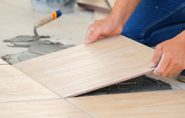 Flooring Tile Being Installed