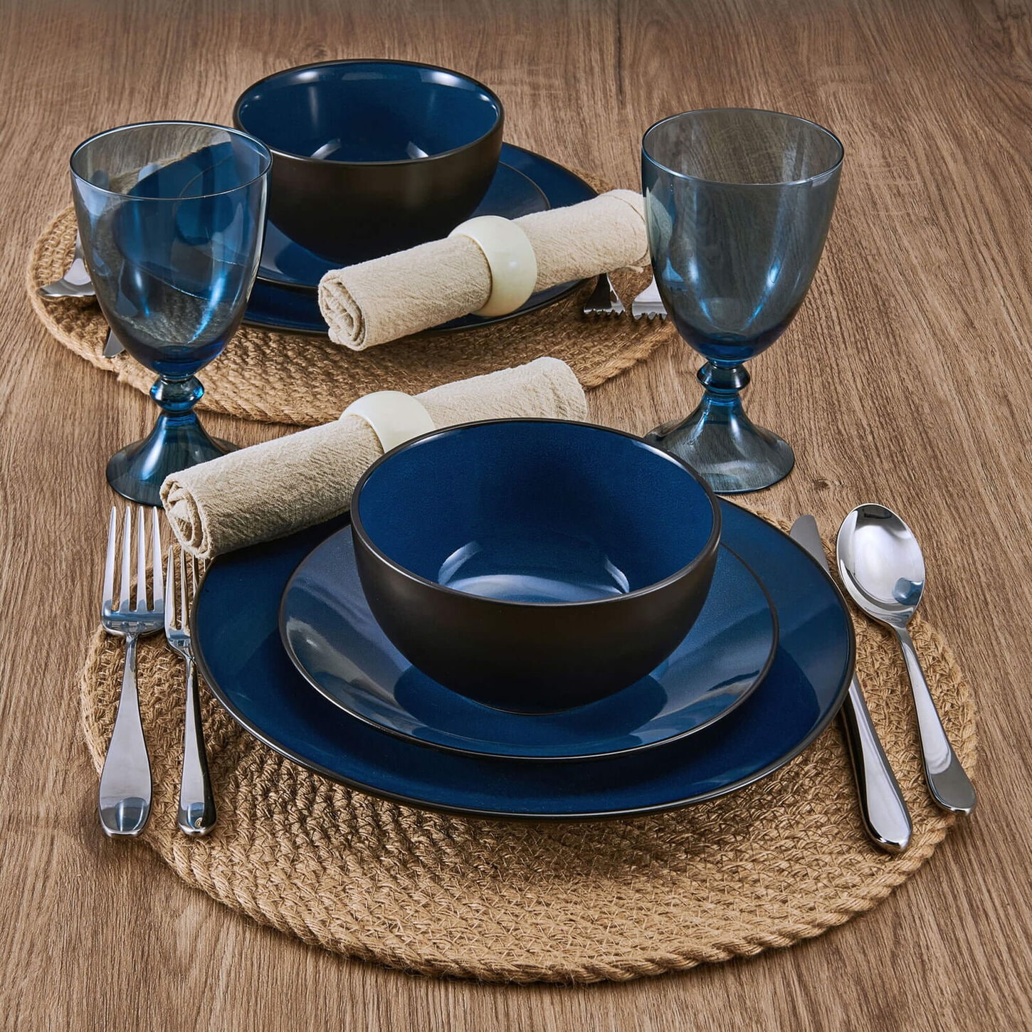 blue dishware placed on a woodgrain table