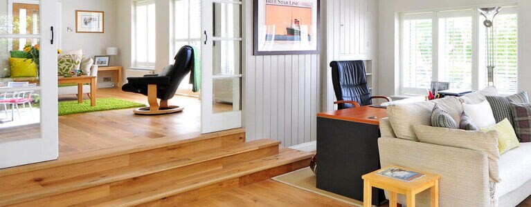Living room with light wood flooring throughout