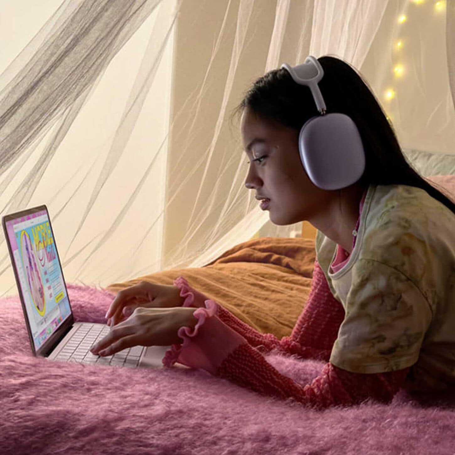 Apple laptop computer and headphones