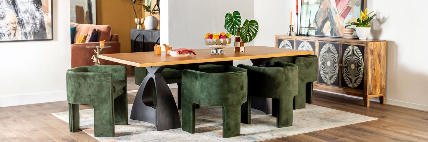 Dining room featuring an oak dining table and green upholstered dining chairs