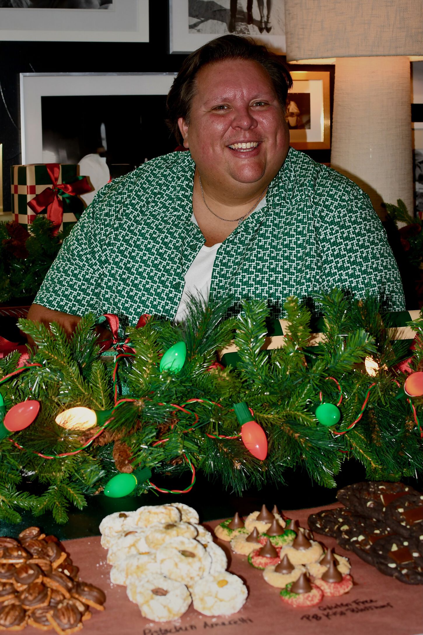 Kendell posing with the cookies at the cookie exchange party