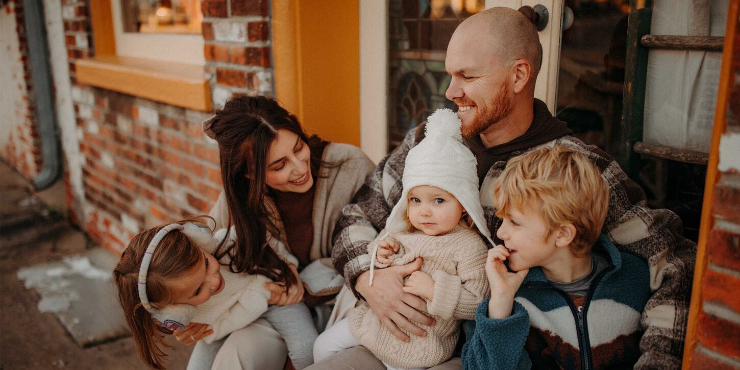Megan Wilson and her family outside their home